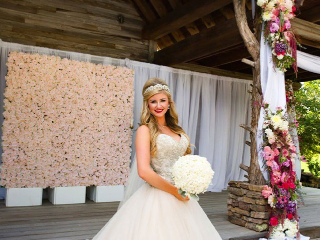 Bride Lindsey during her dream wedding put on by Posey Peddler