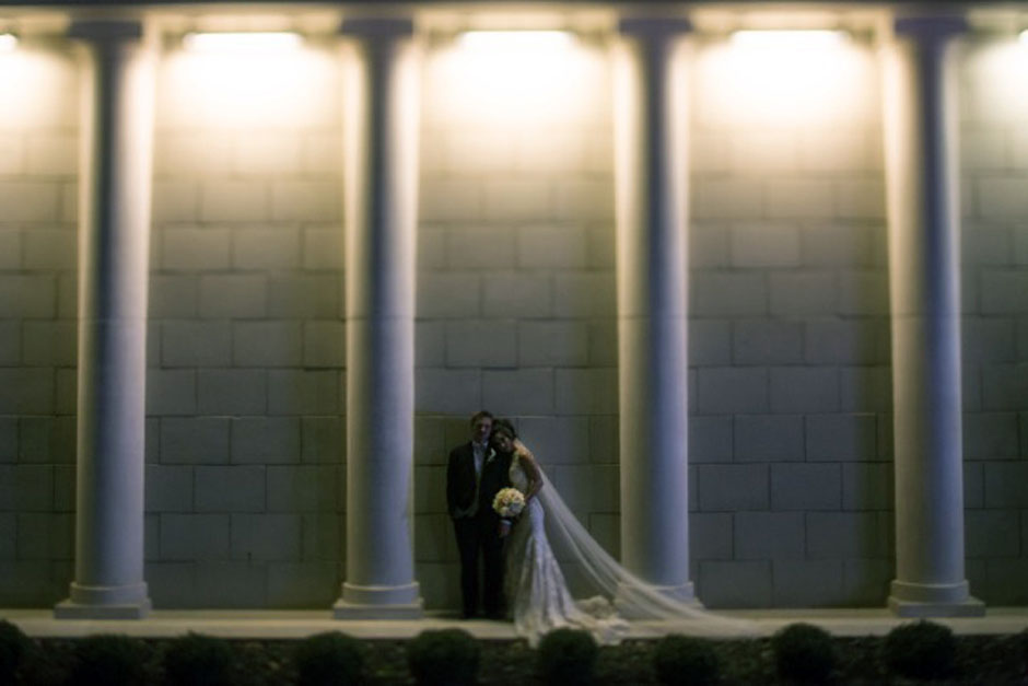 Chrys and Austin taking a photo together outside the beautiful First United Methodist church.